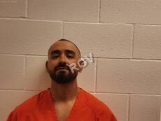 Garcia, Martinez mugshot
